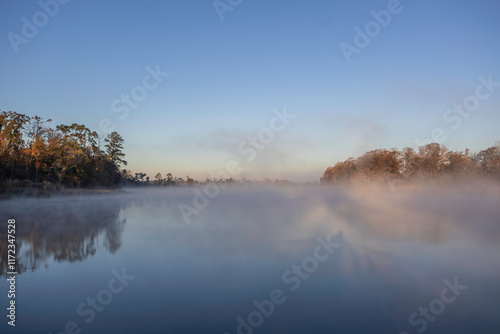 Cold, misty sunrise over Lake Seminole in Three Rivers State Park near Sneads, FL