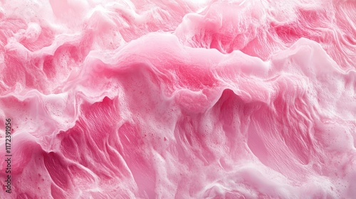 Pink ocean waves creating a textured background ideal for interior design inspiration and tropical beach themes. photo