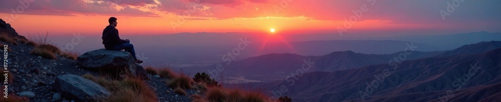 Seated boulder on a hillside with vast expanse of craters stretching out towards the horizon during dawn, horizon, moonrise, cratered landscape Seated boulder on a hillside with vast expanse of craters stretching out towards the horizon during dawn, horizon, moonrise, cratered landscape