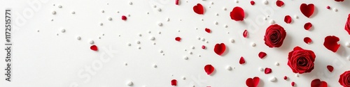 Minimalist arrangement of red roses and heart petals scattered on a white background