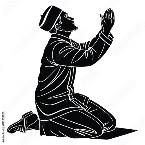 Silhouette of a muslim man in traditional attire praying on his knees for cultural and religious stock images