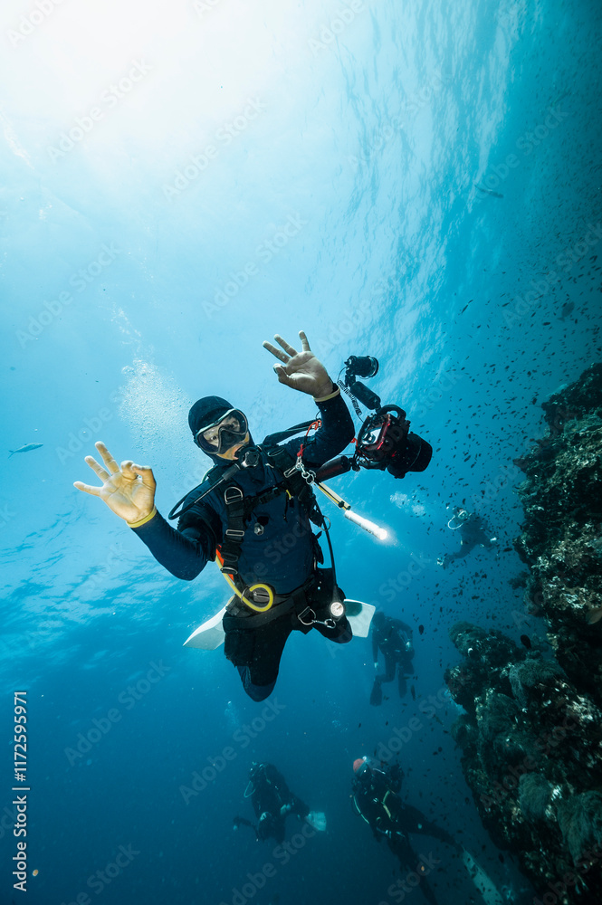 diver descending into the tropical waters around the Similan islands