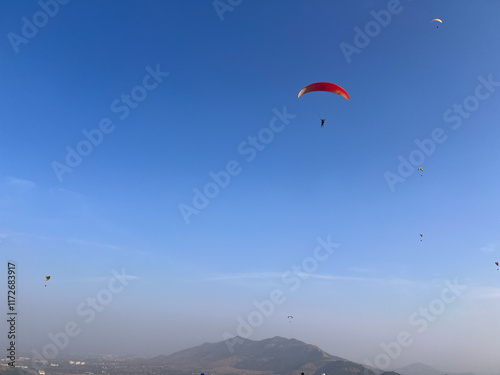 Lonavala, Maharashtra (india) : November 28, 2024 - Paragliding at Kamshet photo