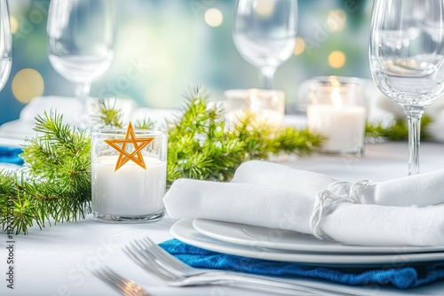 Festive table setting on Jewish religious holyday in white background during Hanukkah celebration. Still life Hanukkah arrangement  photo