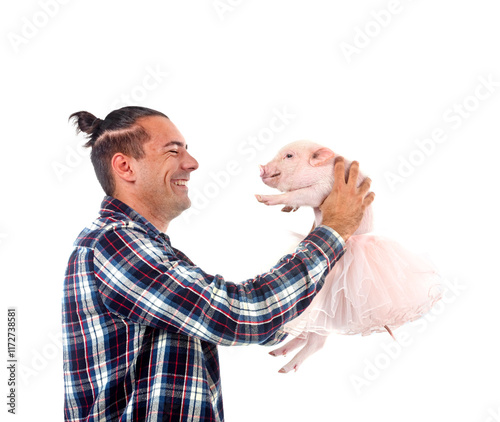 miniature pig and man in studio