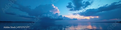 Wallpaper Mural A majestic storm cloud looming over a peaceful lake, atmosphere, blue Torontodigital.ca