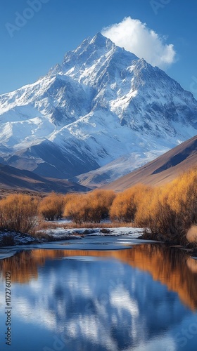 Majestic Snow-Capped Mountain Reflecting Serene Autumn Valley Photo - Wide Shot. AI Generated