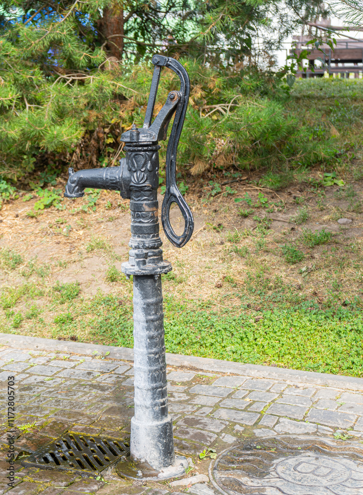Street sculpture of water tap, Retro water column. Vladimir. High quality photo Street sculpture of water tap, Retro water column. Vladimir. High quality photo