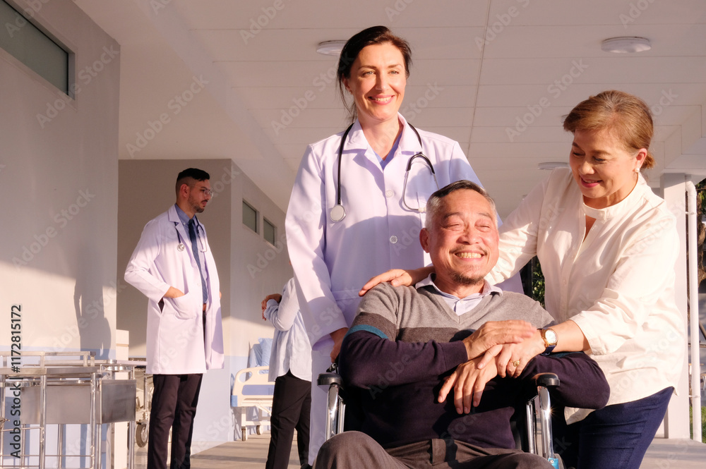 Female doctor cares for elderly male patient in wheelchair in hospital. Female doctor cares for elderly male patient in wheelchair in hospital.