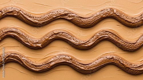 Smooth and Creamy Chocolate Swirls on Golden Background
