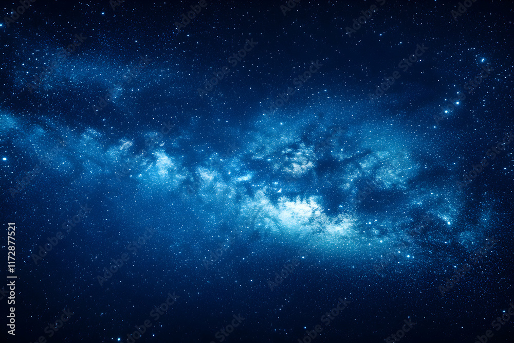 Fototapeta premium Stunning night sky image showcasing the Milky Way galaxy in vibrant blue hues. Perfect for backgrounds, astronomy projects, and space-themed designs.