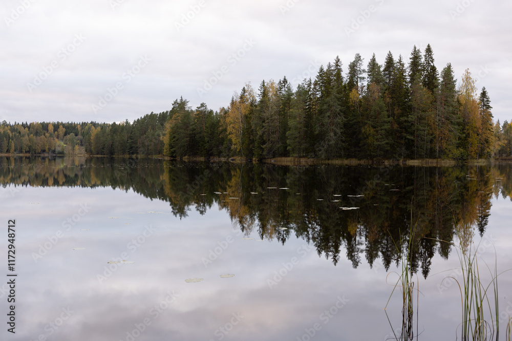 Cloudy evening by the lake at October in Finland Cloudy evening by the lake at October in Finland