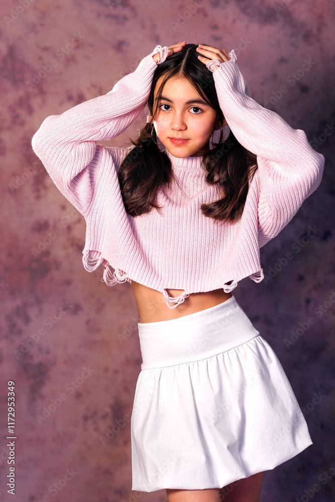 Portrait of asian beautiful girl kid isolated on black background. Teen girl kazakh in studio shot. Advertising child