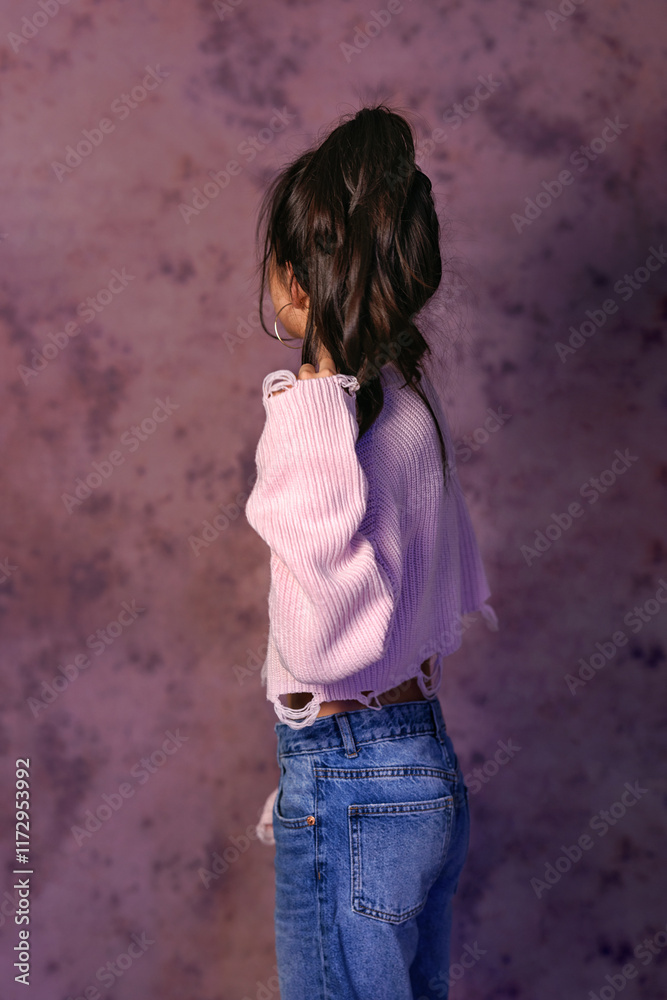 Portrait of asian beautiful girl kid isolated on black background. Teen girl kazakh in studio shot. Advertising child