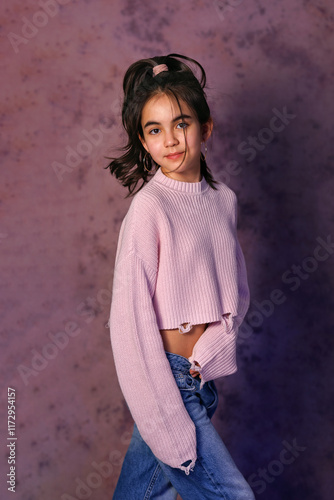 Obraz na płótnie Portrait of asian beautiful girl kid isolated on black background. Teen girl kazakh in studio shot. Advertising child w salonie