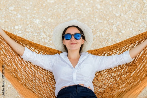 Woman Relaxing in Hammock on Beach, Enjoying Summer Vacation