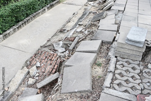 Collapse on the sidewalk, destroyed pavement