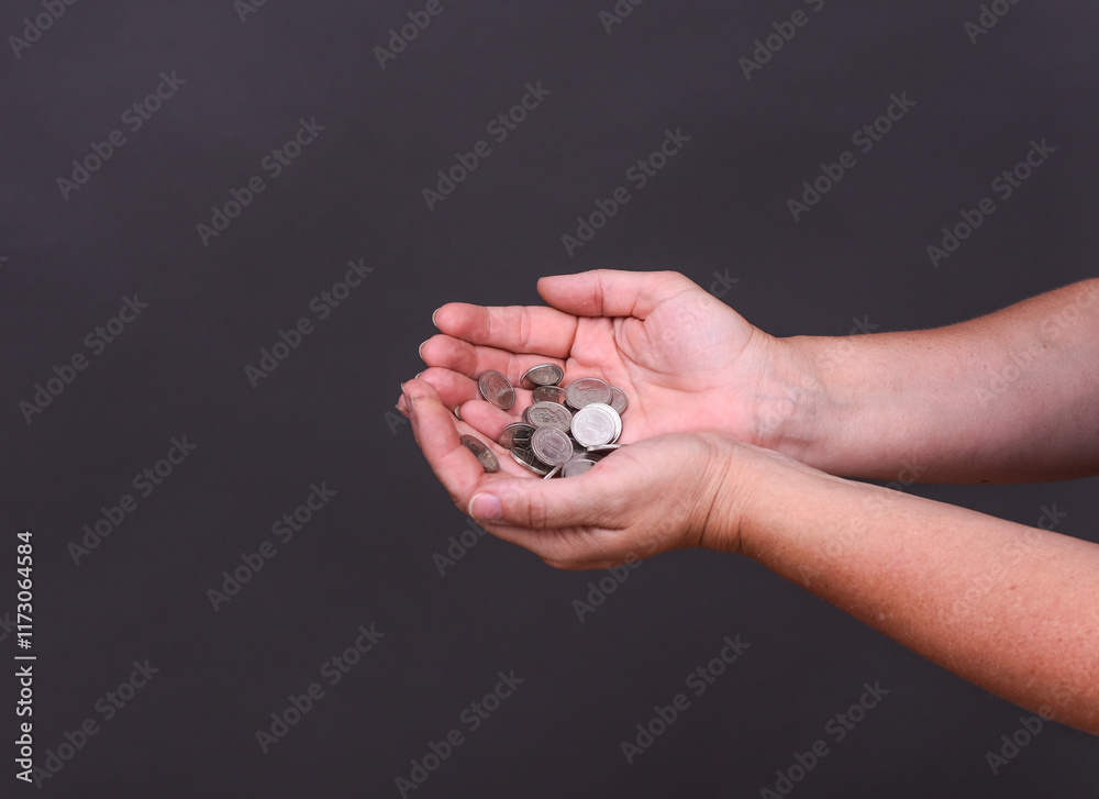 coins in the palms of your hands. concept of the Ukrainian hryvnia. copy space coins in the palms of your hands. concept of the Ukrainian hryvnia. copy space