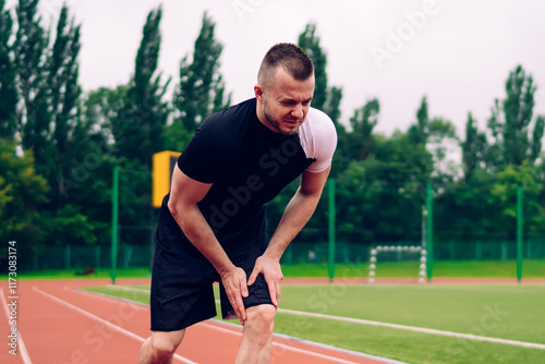 Sportsman getting hurt on track during training