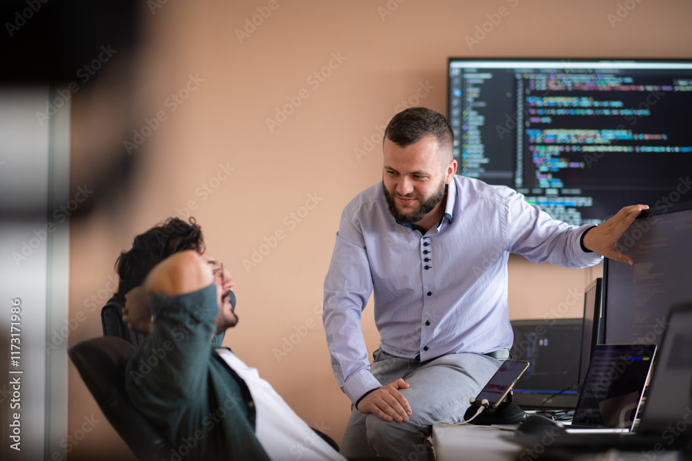 Programmers engrossed in deep collaboration, diligently working together to solve complex problems Programmers engrossed in deep collaboration, diligently working together to solve complex problems