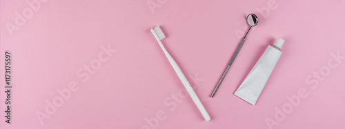 Mock-up healthy white tooth, toothbrush and toothpaste on pink background. Concept for dental clinic, dentistry, healthcare, oral care. Oral hygiene, professional teeth cleaning. Copyspace for text