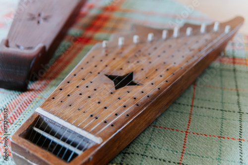 wooden kokle folk music instrument