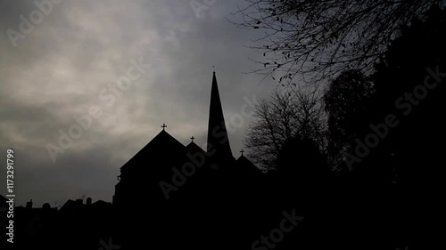 Creepy church with twisted spire in silhouette. St Mary’s Church, Cleobury Mortimer, Shropshire, England, with twisted spire, UK, landscape