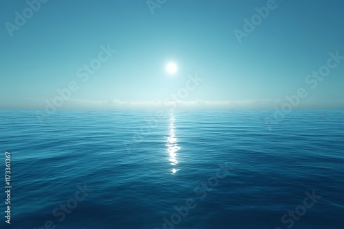 Calm ocean, sun reflecting on water.