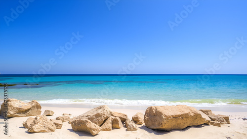 View of rocks in sea on sandy Agia Anna beach, Naxos island, Cyclades, Greece photo