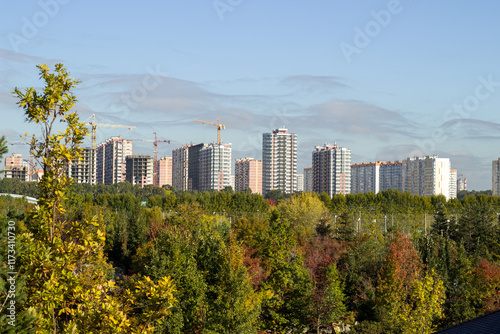 Construction of new multi-storey buildings, view from the green park photo