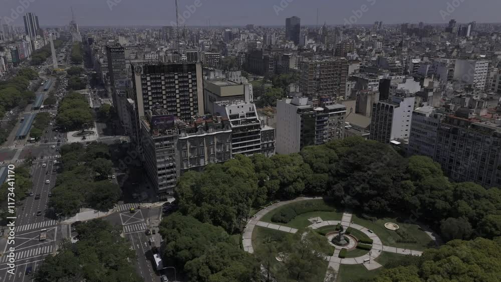 Drone flies southwest from Avenida 9 de Julio over Plaza Libertad in Buenos Aires, Argentina Drone flies southwest from Avenida 9 de Julio over Plaza Libertad in Buenos Aires, Argentina