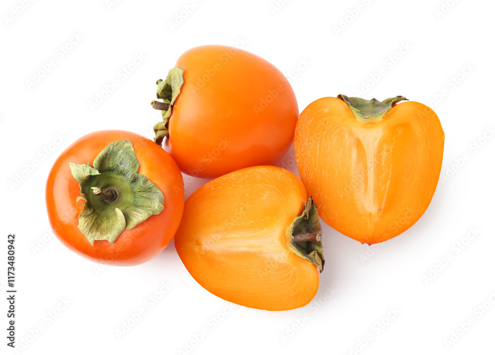 Whole and cut fresh persimmons isolated on white, top view Whole and cut fresh persimmons isolated on white, top view