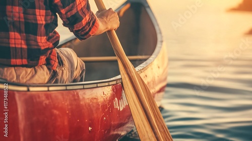 Canoeing at Sunset Golden Hour Man Paddling Red Canoe Lake
