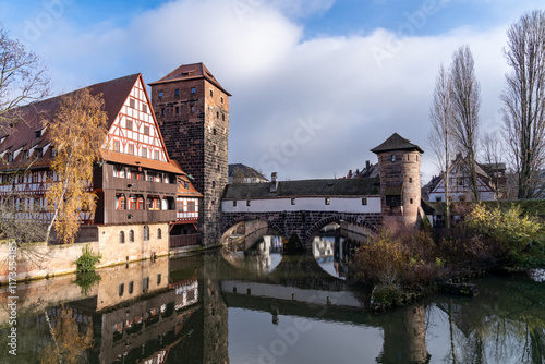 View from the famous Maxbrucke bridge in this historic old town of Nuremberg Germany, Bavaria, with reflection, taken in winter photo