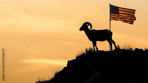 Silhouette of a bighorn sheep on a mountain with usa flag at sunset, symbolizing natural beauty and USA strength