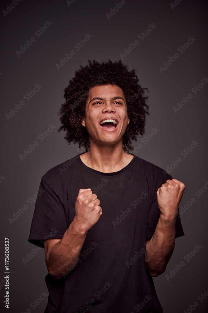 Studio Portrait of a young mixed race man. Studio Portrait of a young mixed race man.