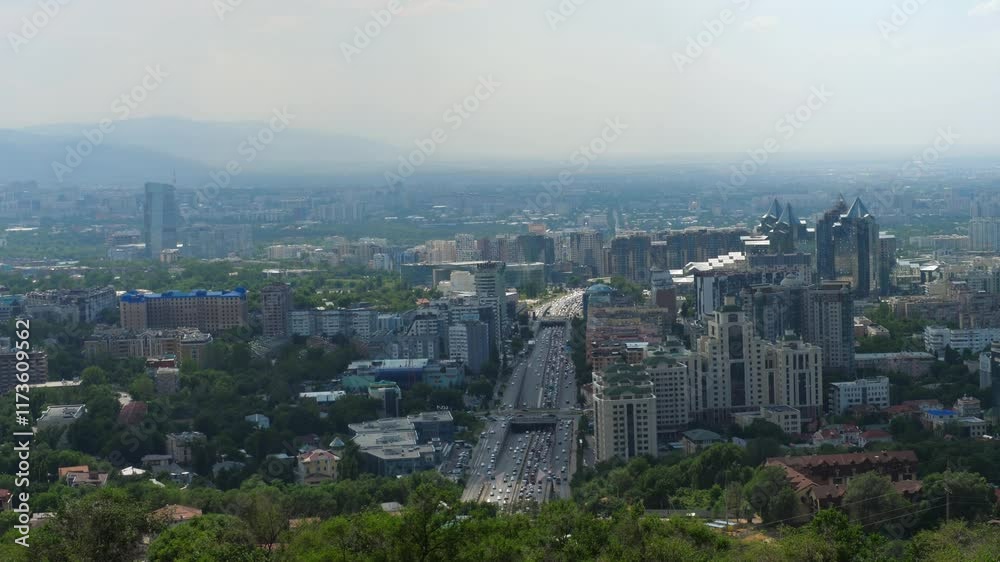 Beautiful city view of Almaty from top of the hill Kok tobe. Republic of Kazakhstan, Central Asia. City architecture, urban space.