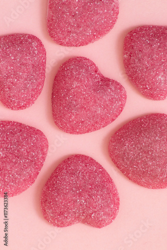 Pink heart candy jelly beans on pink background, lovers day, valentine's day, candy, candy, love