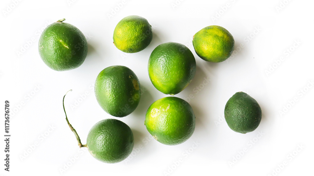 Φωτογραφία Isolated unripe green lemon fruits, a species of citrus native to Asia commonly used all over the world primarily for drinks such as lemonade or lemon tea