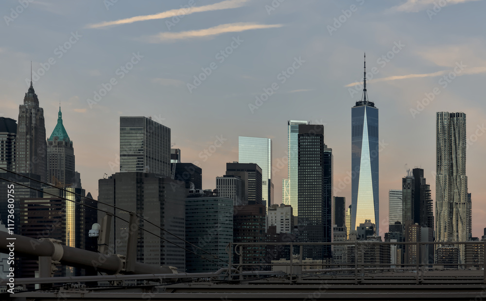 view of new york city skyline from brooklyn bridge (manhattan skyscrapers nyc) travel tourism destination landmark sunrise dawn (dark sun rising) suspension cables colorful sky beautiful photography view of new york city skyline from brooklyn bridge (manhattan skyscrapers nyc) travel tourism destination landmark sunrise dawn (dark sun rising) suspension cables colorful sky beautiful photography