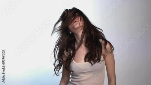 Graceful Movement of a Young Woman Dancing in Studio