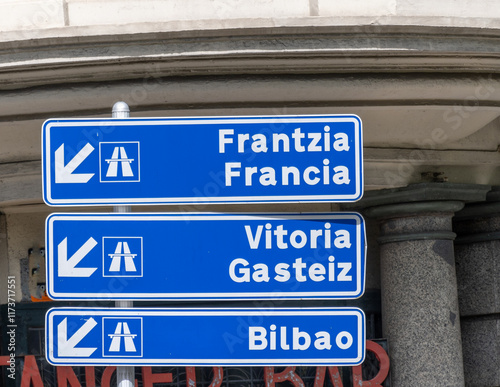 Road signs and directions, driving car in summer on French road, tourists destinations French cities and villages, different types or roads in France, transportation and traffic problems photo