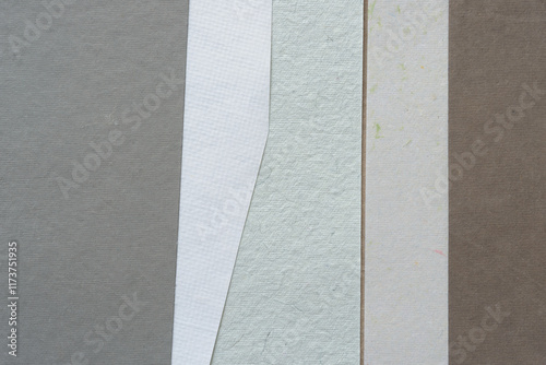 paper background featuring stripes with texture in a neutral color scheme photo