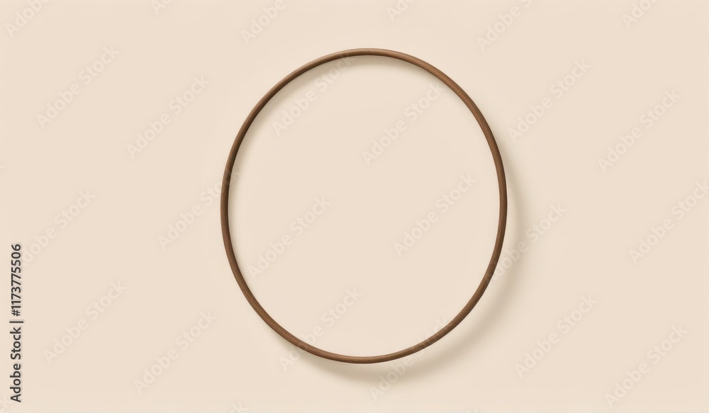 A minimalist image of a perfectly round, off-white disc against a neutral backdrop. A minimalist image of a perfectly round, off-white disc against a neutral backdrop.