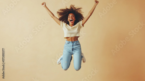 A vibrant capture of joy expressed physically through movement and smiles.
