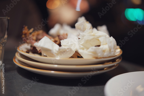 Wallpaper Mural Crumpled used napkins and leftover food standing on a table in a restaurant Torontodigital.ca