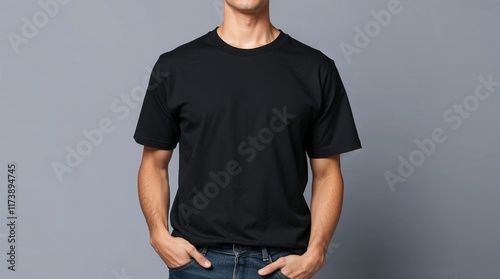 Plain black t-shirt mockup displayed on a male model with hands in pockets