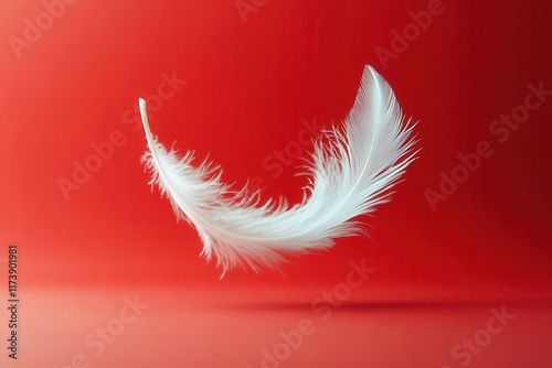 White feather flying on red background. Abstract bird feather falling on color background. Symbol of peace or freedom concept. Generated AI