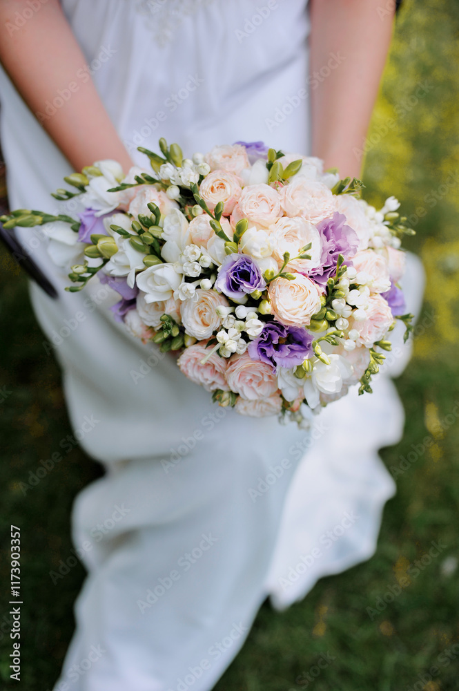 Bride Holding Elegant Pastel Rose and Lavender Floral Wedding Bouquet Bride Holding Elegant Pastel Rose and Lavender Floral Wedding Bouquet