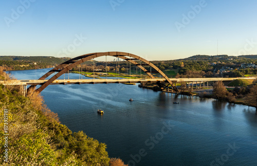 Pennybacker suspension bridge or 360 Bridge from overlook by Colorado River near Austin TX photo